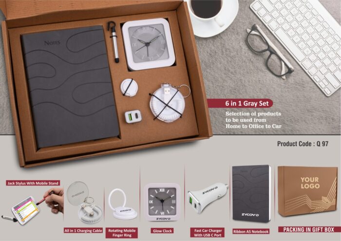 6 in 1 Gray set: Mobile Finger ring, All in 1 Cable with Keychain, Fast Dual USB Car charger, Jack stylus with phone stand, Glow Clock and A5 PU notebook in Kraft Gift Box